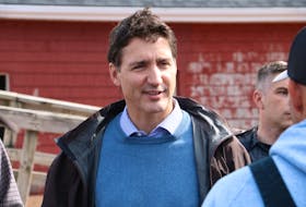 Prime Minister Justin Trudeau surveyed damage at the Stanley Bridge marina during a P.E.I. visit on September 27. The wharf sustained significant damage during post-tropical storm Fiona.  - Stu Neatby