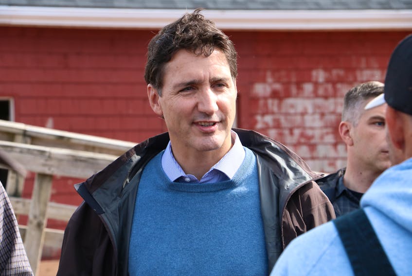 Prime Minister Justin Trudeau surveyed damage at the Stanley Bridge marina during a P.E.I. visit on September 27. The wharf sustained significant damage during post-tropical storm Fiona.  - Stu Neatby