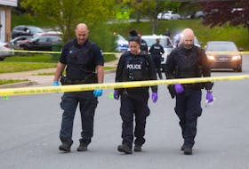 Halifax Regional Police search for evidence on Roleika Drive in Dartmouth on Thursday, May 26, 2022. There were no reported injuries and members of the forensic identification section were processing the crime scene.
Ryan Taplin - The Chronicle Herald