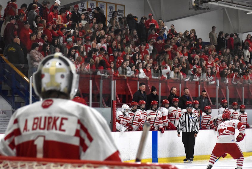 Riverview goaltender Andrew Burke, left, looks on as a large crowd of students cheer on the Ravens during their Cape Breton High School Hockey League home opener at the Cape Breton County Recreation Centre in Coxheath in October. The Red Cup is expected to draw a large crowd of students to the facility next week. JEREMY FRASER/CAPE BRETON POST