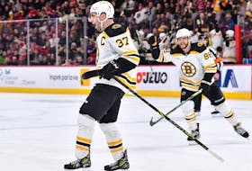 Patrice Bergeron of the Boston Bruins celebrates his goal during the third period against the Montreal Canadiens at the Bell Centre in Montreal on Jan. 24, 2023.