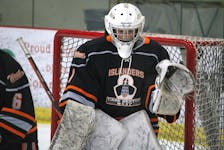 Cape Breton West Islanders goaltender Rhyah Stewart prepares for the faceoff during Nova Scotia Under-18 Major Hockey League action earlier this season in Berwick. Stewart made Islanders’ history this season becoming the first female to play for the Port Hood-based organization. JASON MALLOY/SALTWIRE NETWORK