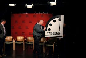The clock with the Bulletin of the Atomic Scientists is being placed at a TV studio ahead of the announcement of the location of the minute hand on its Doomsday Clock, indicating what world developments mean for the perceived likelihood of nuclear catastrophe, at the National Press Club in Washington, U.S., January 24, 2023. REUTERS/Leah Millis  The clock with the Bulletin of the Atomic Scientists is placed at a TV studio at the National Press Club in Washington on Tuesday, ahead of the announcement of the location of the minute hand on its Doomsday Clock, indicating what world developments mean for the perceived likelihood of nuclear catastrophe. The clock was reset to represent 90 seconds before midnight, the closest it has ever been to a nuclear holocaust. REUTERS/Leah Millis