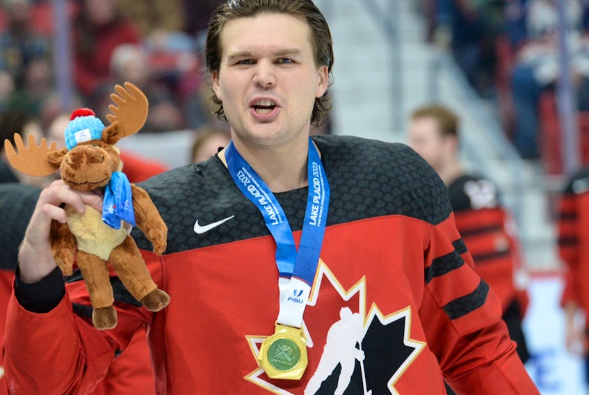 UPEI Panthers defenceman Matt Brassard celebrates Team Canada’s gold-medal win at the FISU Winter World University Games in Lake Placid, N.Y., on Jan. 23. Brassard is from Barrie, Ont. U Sports • Special to The Guardian