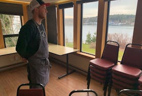 With yachts on the Northwest Arm in the background, chef Colin Bebbington checks out the Atlantic School of Theology space that will be the site of his new popup restaurant.