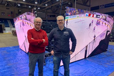 John Abbott, left, interim general manager of the Eastlink Centre in Charlottetown, and Mark Fisher, president of the Gemini Group of Companies, say the new 360-degree digital scoreboard will be installed for the Jan. 27 Atlantic University Sport men’s hockey game featuring UPEI and Saint Mary’s. Dave Stewart • The Guardian
