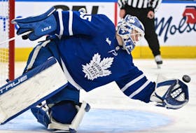 Toronto Maple Leafs goaltender Ilya Samsonov makes a glove save during his team's overtime win over the New York Rangersat Scotiabank Arena on Jan. 25, 2023.