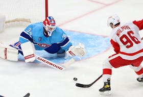 Detroit Red Wings' Jake Walman shoots on Montreal Canadiens' Jake Allen during second period in Montreal on Jan. 26, 2023.