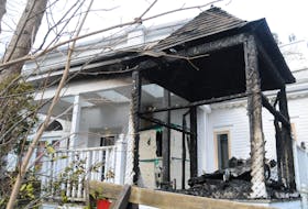 The aftermath of a fire at the rear of 1 Bonaventure Ave., behind The Rooms. Police say the Wednesday, Jan. 25, fire was the result of arson, and a man has been charged. The house, which is designated as a heritage structure, sustained extensive damage. Photo by Joe Gibbons • The Telegram