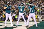 DeVonta Smith of the Philadelphia Eagles celebrates a touchdown with teammate A.J. Brown  during the first quarter against the New York Giants in the NFC Divisional Playoff game at Lincoln Financial Field on January 21, 2023 in Philadelphia.