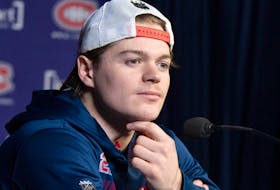 Montreal Canadiens forward Cole Caufield speaks to the media about his season-ending shoulder injury on 27, 2023, in Montreal.