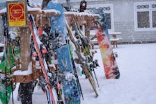 Skis and snowboards lined the racks at Ski Martock during the first real snowfall of the season.