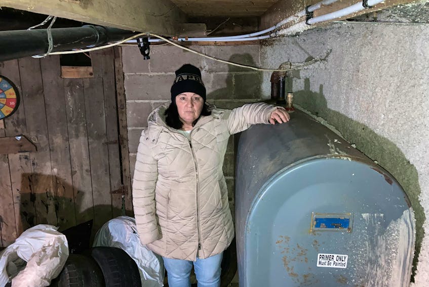 Alexandra Chapman said she was angry when someone stole her furnace oil while she slept, but now she is fearful at night in her Berwick home. - Ian Fairclough
