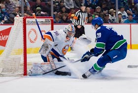  New York Islanders goalie Ilya Sorokin (30) makes a save on Vancouver Canucks forward Lane Pederson (29) in the first period at Rogers Arena. Bob Frid-USA TODAY Sports