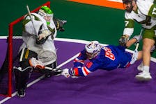 Halifax Thunderbirds forward Cody Jamieson dives across the crease on a scoring attempt against Rochester Knighthawks goalie Rylan Hartley during first-quarter National Lacrosse League action at the Scotiabank Centre on Friday, Jan. 27, 2023.
Ryan Taplin - The Chronicle Herald