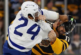 Maple Leafs'  Wayne Simmonds fights with former teammate Nick Foligno of the Bruins during the first period at TD Garden.     