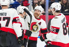 Claude Giroux, seen celebrating with Ottawa Senators teammates in a game Jan. 27 in Toronto, finished with four goals and seven points in the club's three straight wins last week.