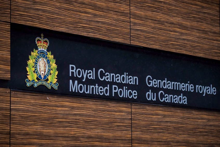 The RCMP logo is seen outside Royal Canadian Mounted Police "E" Division Headquarters, in Surrey, B.C., April 13, 2018.