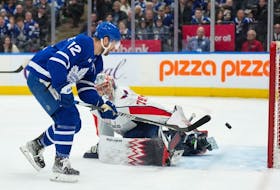 Maple Leafs forward Zach Aston-Reese scores on Washington Capitals goaltender Charlie Lindgren during the third period at Scotiabank Arena on Sunday. 