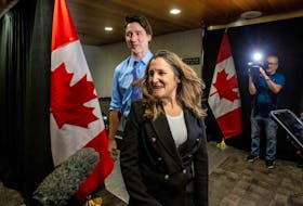 Prime Minister Justin Trudeau and Finance Minister Chrystia Freeland, centre right, arrive at a federal cabinet retreat in Hamilton, Ont., on Jan. 23.