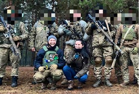 Ukrainian journalist Olga Khudetska (right), who now provides tactical medical training to Ukrainian troops, raised concerns about equipment donated by Mriya Aid.