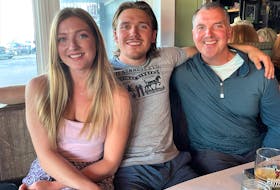 Eddie Hickey with his daughter Maddie and son Jacob. Thoughts of his kids, 14 and 12 at the time, at home by themselves were front and centre even as Eddie started to go into cardiac arrest at a hockey arena back in 2011. Contributed
