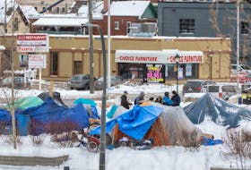 A homeless encampment in Kitchener, Ontario at the corner of Victoria Street and Weber Street, Monday January 31, 2023,   