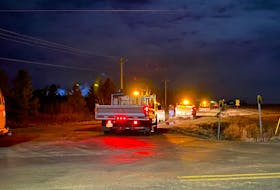 The bottom of Murray Road in Borden-Carleton was blocked off to non-emergency personnel while crews attended a fire at D&E Pork Inc. – Kristin Gardiner