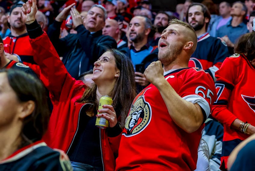 Ottawa Senators fans cheer during second period NHL action at Canadian Tire Centre on Oct. 18, 2022. 