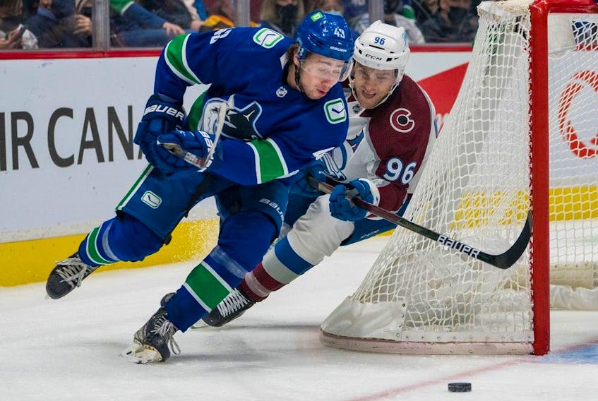 Canucks defenceman Quinn Hughes (left) will feel the heat from Colorado Avalanche forwards like Mikko Rantanen when the teams meet Thursday at Rogers Arena.