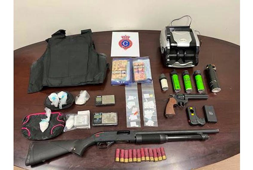 Police seized drugs, paraphernalia and other items connected to drug trafficking after searching a St. John's home on Dec. 16.