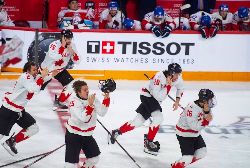 Canadian players race out from the bench to celebrate their 3-2 overtime win over Czechia in the gold-medal game at the IIHF World Junior Hockey Championship in Halifax on Thursday, Jan. 5, 2023.
Ryan Taplin - The Chronicle Herald