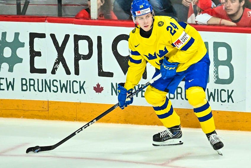 Jonathan Lekkerimaki of Team Sweden skates the puck during the first period against Team Canada in the 2023 IIHF World Junior Championship at Scotiabank Centre on Dec. 31, 2022 in Halifax, Nova Scotia, Canada. Team Canada defeated Team Sweden 5-1.