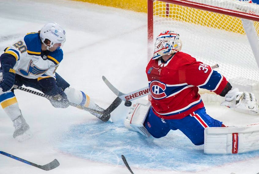 St. Louis Blues' Brandon Saad (20) scores on Canadiens goaltender Jake Allen in Montreal on Saturday, Jan. 7, 2023.  