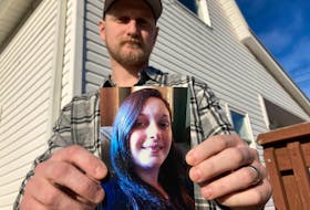 Tidnish Bridge Fire and Rescue Deputy Chief Allison Holthoff died in the Cumberland Regional Health Care Centre. Her husband, Gunter Holthoff holds her picture.