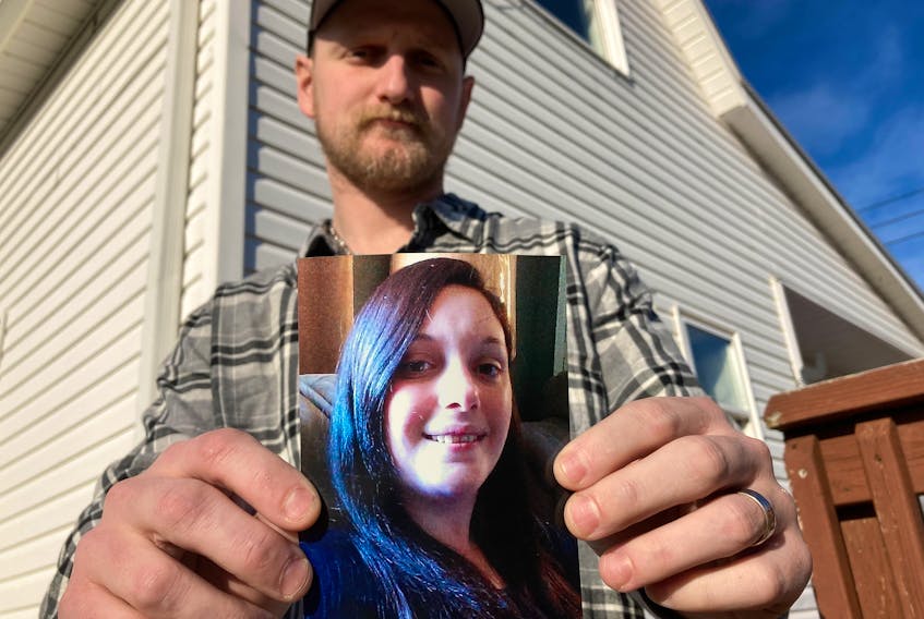 Tidnish Bridge Fire and Rescue Deputy Chief Allison Holthoff died in the Cumberland Regional Health Care Centre. Her husband, Gunter Holthoff holds her picture.
