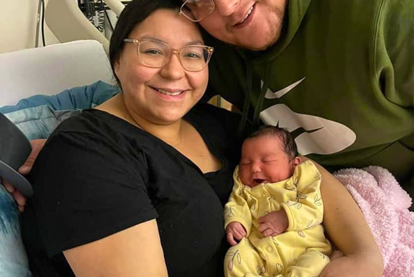 Tikisha Paul-Gould and fiancé Jordan Mitchell smile as they show off their newborn daughter, Iris Emily Mitchell, who was born Jan. 2 at 11:58 a.m. at St. Martha's Hospital in Antigonish. CONTRIBUTED/FACEBOOK
