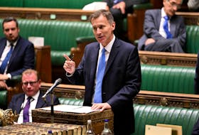MANCHESTER, England (Reuters) - British finance minister Jeremy Hunt on Monday will announce a rise in the minimum wage in his annual Conservative party conference speech, where he is expected to