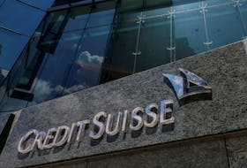 ZURICH (Reuters) - Credit Suisse has reached an 11th-hour out-of-court settlement with Mozambique over the $1.5 billion-plus "tuna bond" scandal, the Swiss bank's new owner UBS said on Sunday, drawing