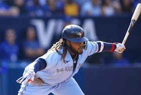 Jays slugger Vladimir Guerrero Jr. chases a pitch for a strike against the Tampa Bay Rays at Rogers Centre Saturday. Getty Images