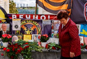By Guy Faulconbridge MOSCOW (Reuters) - At memorials to Yevgeny Prigozhin, who was killed in an unexplained plane crash exactly 40 days ago, dozens of mourners hailed the mutinous mercenary chief as a