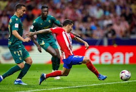MADRID (Reuters) - Argentine forward Angel Correa struck twice to help Atletico Madrid recover from a two-goal deficit and beat Cadiz 3-2 at home on Sunday to claim their third successive LaLiga win.