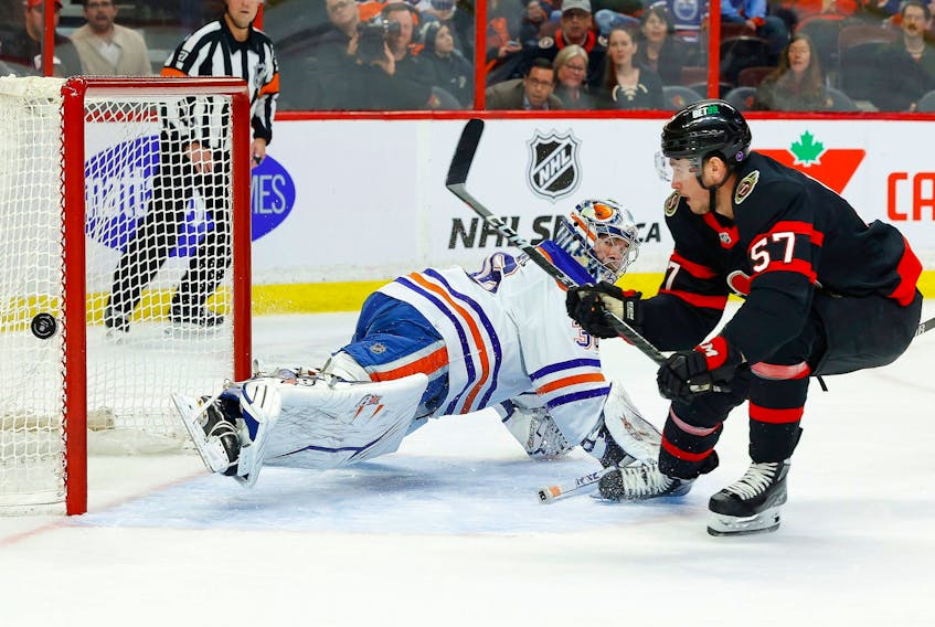 Edmonton Oilers goaltender Jack Campbell (36) stops Ottawa Senators centre Shane Pinto during a game last season.