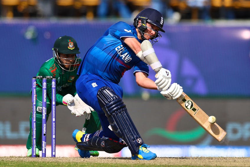 Cricket - ICC Cricket World Cup 2023 - England v Bangladesh - Himachal Pradesh Cricket Association Stadium, Dharamsala, India - October 10, 2023 England's Sam Curran plays a shot off the bowling of Bangladesh's Mahedi Hasan and is caught out by Najmul Hossain Shanto REUTERS/Andrew Boyers