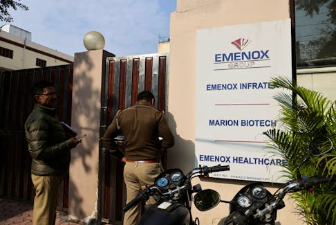 FILE PHOTO: Police is seen at the gate of an office of Marion Biotech, a healthcare and pharmaceutical company and a part of the Emenox Group, whose cough syrup has been linked to the deaths of children in Uzbekistan, in Noida, India, December 29, 2022. REUTERS/Anushree Fadnavis/File Photo