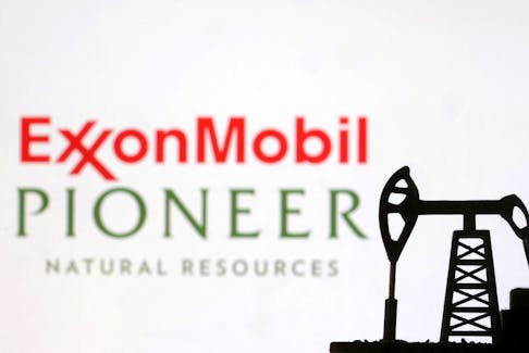 ExxonMobil and Pioneer Natural Resources logos are seen in this illustration taken, October 8, 2023. REUTERS/Dado Ruvic/Illustration