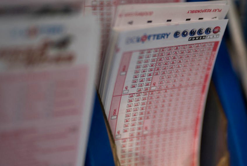 FILE PHOTO: Powerball tickets are seen at a liquor store, in Washington, U.S., July 19, 2023. REUTERS/Nathan Howard/File Photo