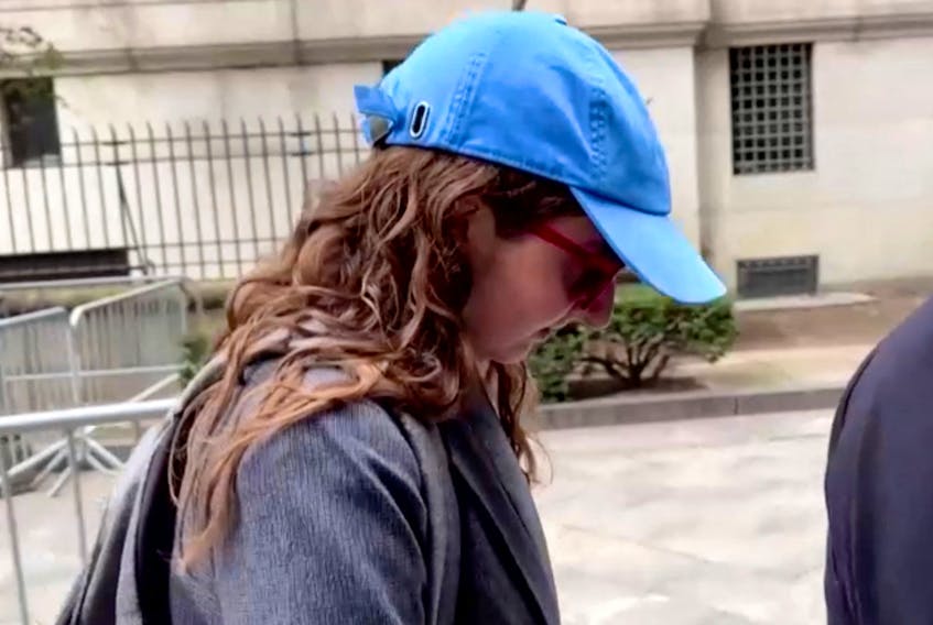 Former crypto hedge fund Alameda Research CEO Caroline Ellison arrives for the trial of former FTX Chief Executive Sam Bankman-Fried, who is facing fraud charges over the collapse of the bankrupt cryptocurrency exchange, at Federal Court in New York City, U.S., October 10, 2023 in this still image from video. Reuters TV via REUTERS