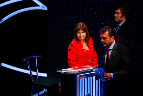 Argentine presidential candidates Sergio Massa, Patricia Bullrich and Javier Milei attend the presidential debate ahead of the October 22 general elections, at the University of Buenos Aires' Law School, Argentina October 8, 2023. REUTERS/Agustin Marcarian/Pool/File Photo