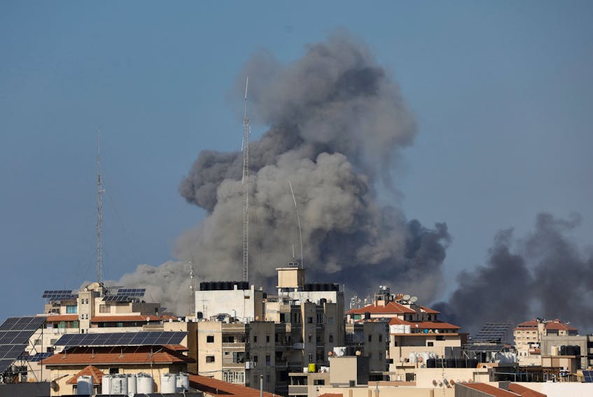 Smoke rises following Israeli strikes in Gaza, October 12, 2023. REUTERS/Saleh Salem